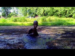 crazy shiny black mud pit in thong